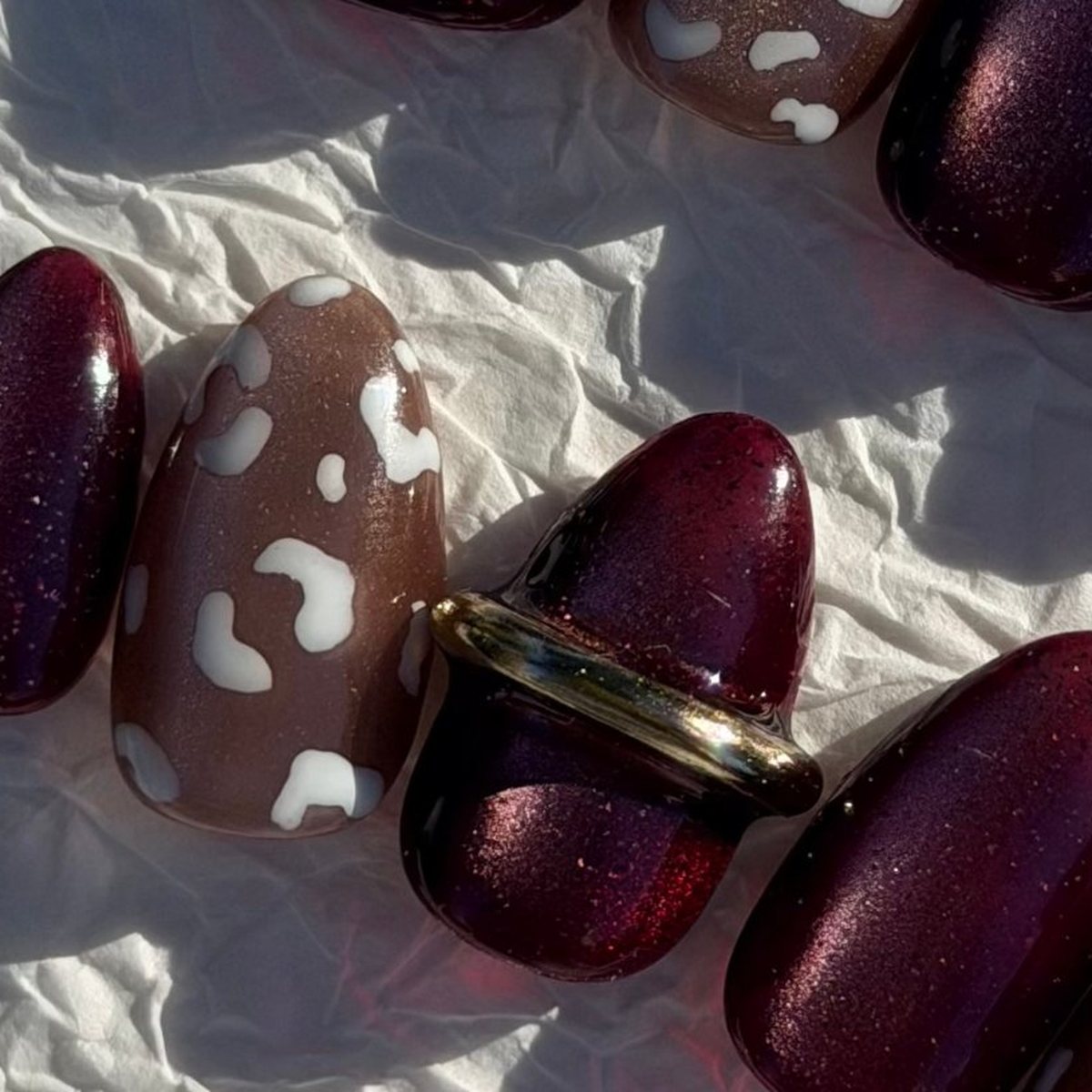 Velvet Leopard press-on nails, close-up of the hand-painted detail